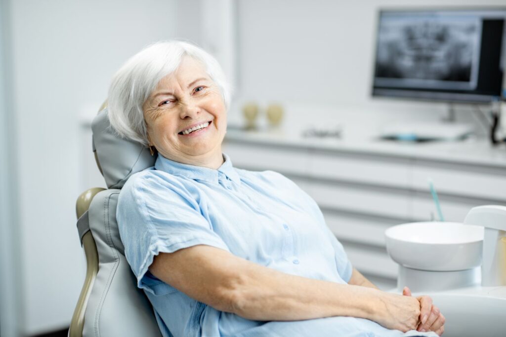 A woman sitting in a dentist’s chair